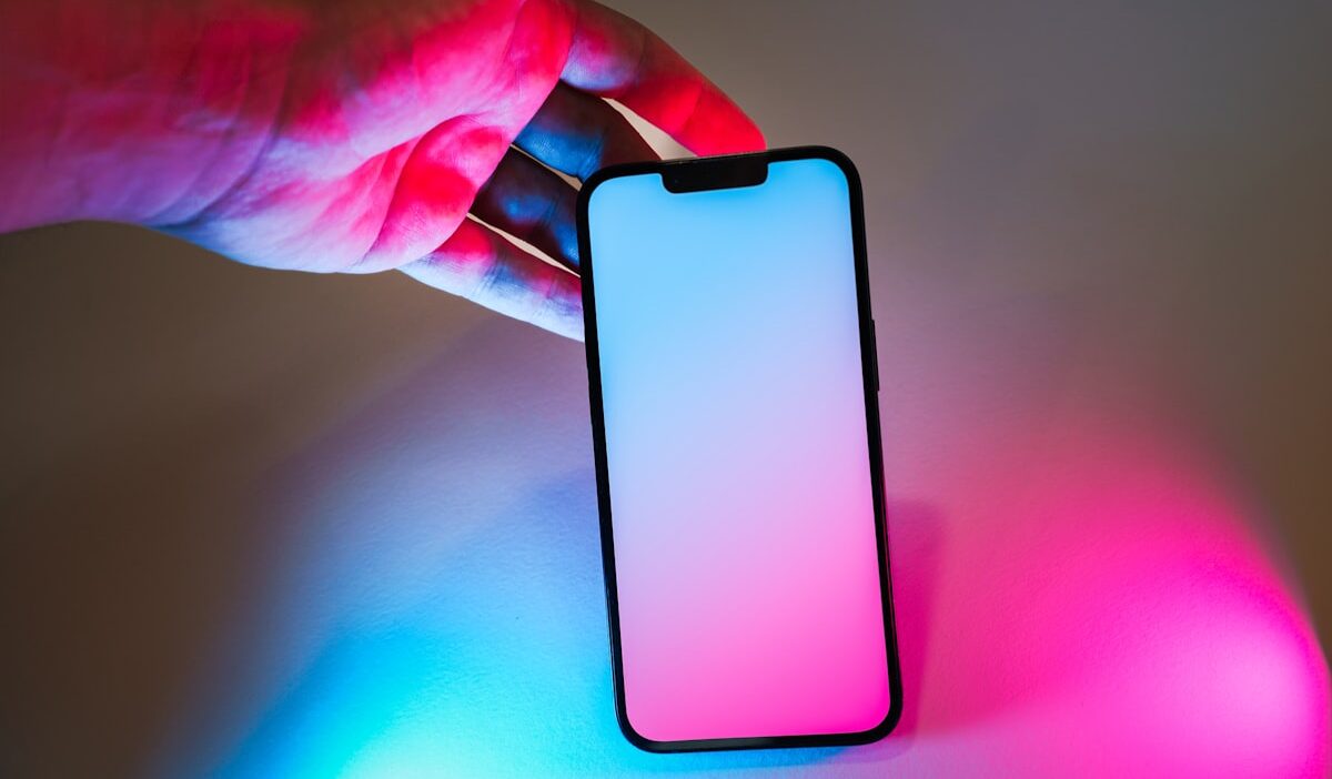 AI-powered mobile SDK bidding auction with glowing circuit overlay symbolizing future in-app monetization