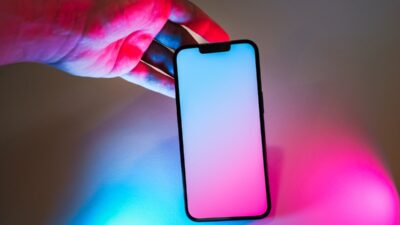 AI-powered mobile SDK bidding auction with glowing circuit overlay symbolizing future in-app monetization
